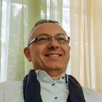 Χρήστος Γκαραβέλας, Φιλόλογος