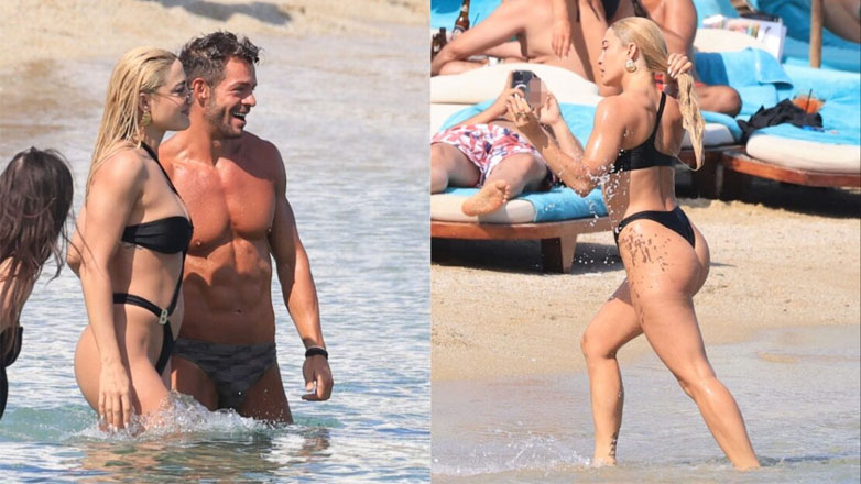 Ιωάννα Τούνη: Βουτιές σε κοσμική παραλία της Μυκόνου με αποκαλυπτικό μαγιό – Μαζί της ο Μηνάς Αηδόνης