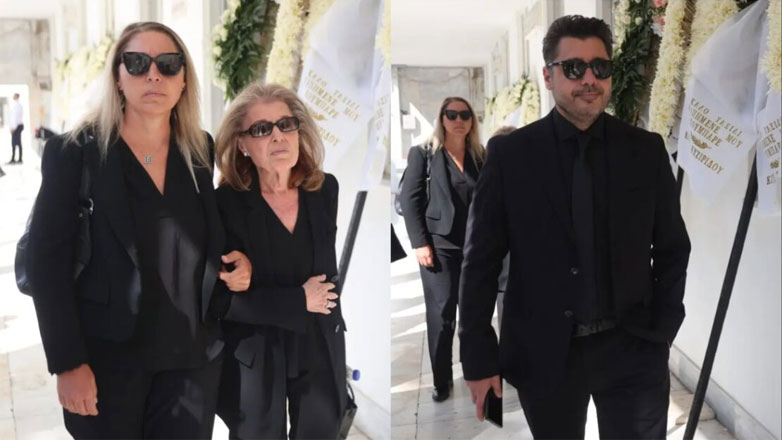 Κηδεία Δημήτρη Κωνσταντάρα: Υποβασταζόμενη η σύζυγός του, Βίκυ Βουρλάκη, από την κόρη τους, Παυλίνα