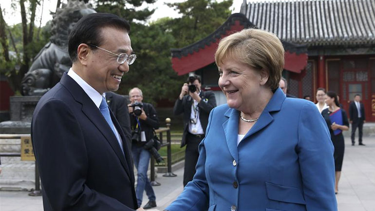 Η Μέρκελ ζήτησε το άνοιγμα της κινεζικής αγοράς στις ξένες επενδύσεις