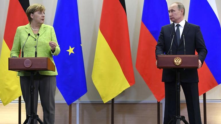 Συμφωνία Πούτιν και Μέρκελ για την υλοποίηση των συμφωνιών του Μίνσκ