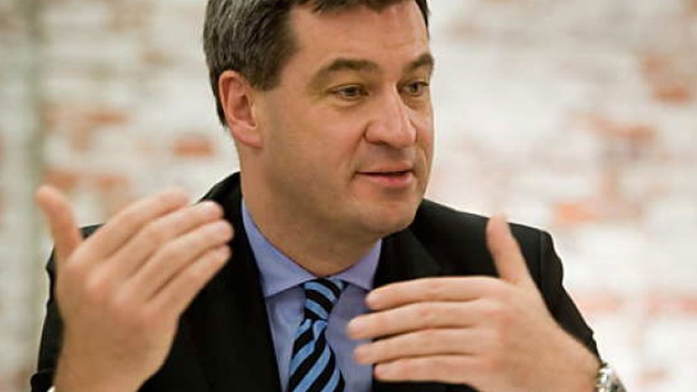 Γερμανία: Ο Σέντερ αντιτίθεται στα σχέδια του Μακρόν για τη μεταρρύθμιση της Ευρωζώνης