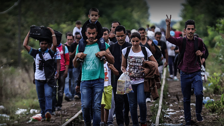 O διπλός ρόλος της Μέρκελ στο προσφυγικό