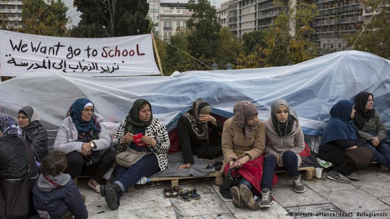 «Μama Merkel, open the doors!»