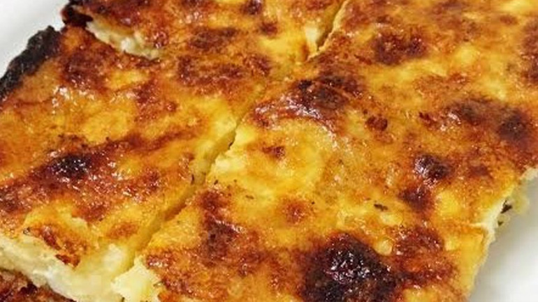 Τυρόπιτα ταψιού με τραχανά και φέτα χωρίς φύλλο