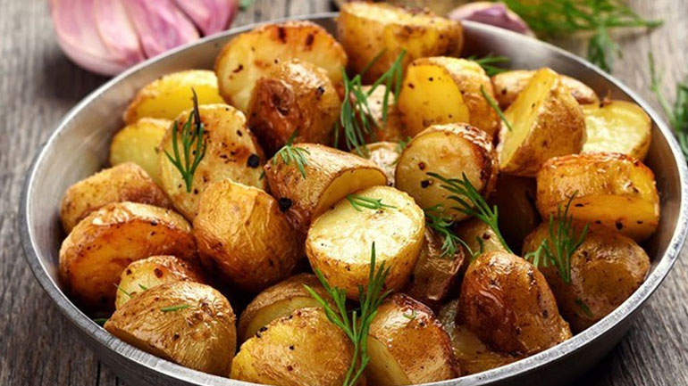 Πατάτες στο φούρνο με πορτοκάλι