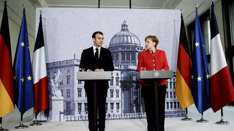 Deutsche Welle: Ο Μακρόν επιταχύνει, η Μέρκελ επιβραδύνει