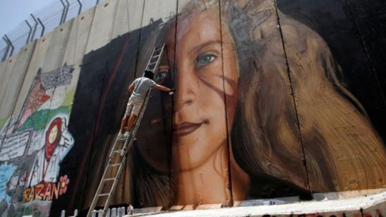 Ισραήλ: Αφέθηκαν ελεύθεροι οι δύο Ιταλοί που ζωγράφισαν το πορτρέτο της Ταμίμι στο Τείχος