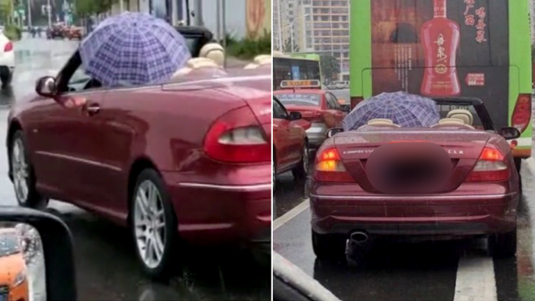 Οδηγεί cabrio και κρατά ομπρέλα!