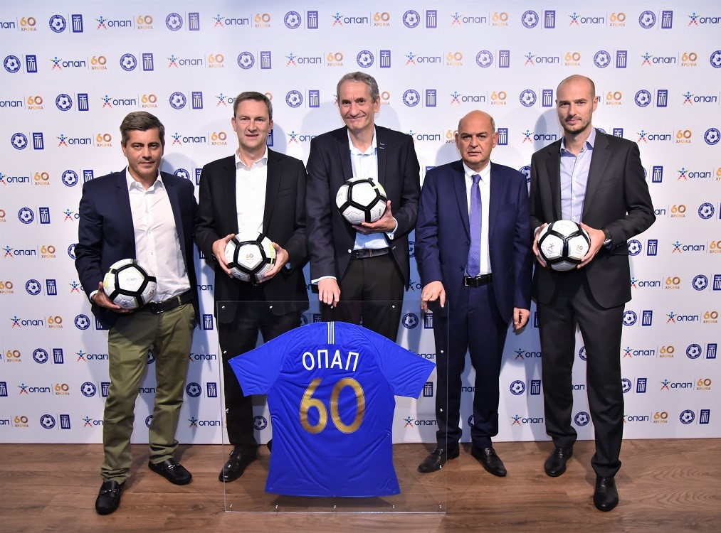 (από αριστερά προς τα δεξιά): Οδυσσέας Χριστοφόρου - Επικεφαλής Εταιρικών και Ρυθμιστικών Υποθέσεων ΟΠΑΠ, Ντάμιαν Κόουπ – Διευθύνων Σύμβουλος ΟΠΑΠ, Καμίλ Ζίγκλερ – Εκτελεστικός Πρόεδρος ΟΠΑΠ, Βαγγέλης Γραμμένος – Πρόεδρος ΕΠΟ, Πέτρ Ματεγιόφσκι - Chief Customer Officer ΟΠΑΠ