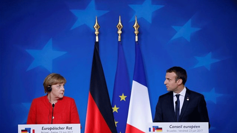 The Times: Σύγκρουση Μέρκελ – Μακρόν για τον επικεφαλής της Ευρωπαϊκής Επιτροπής