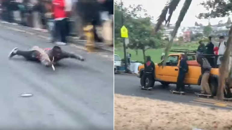 Skaters κατεβαίνουν τάπα έναν απότομο δρόμο