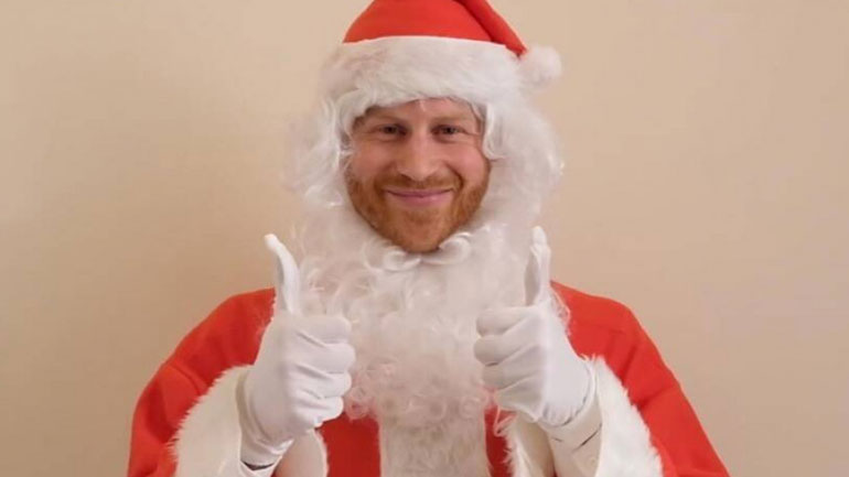 Ο πρίγκιπας Χάρι εύχεται σε ορφανά παιδιά ντυμένος Άγιος Βασίλης