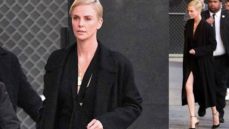 Charlize Theron: Η ultra chic εμφάνιση της star με μαύρο μακρύ παλτό!