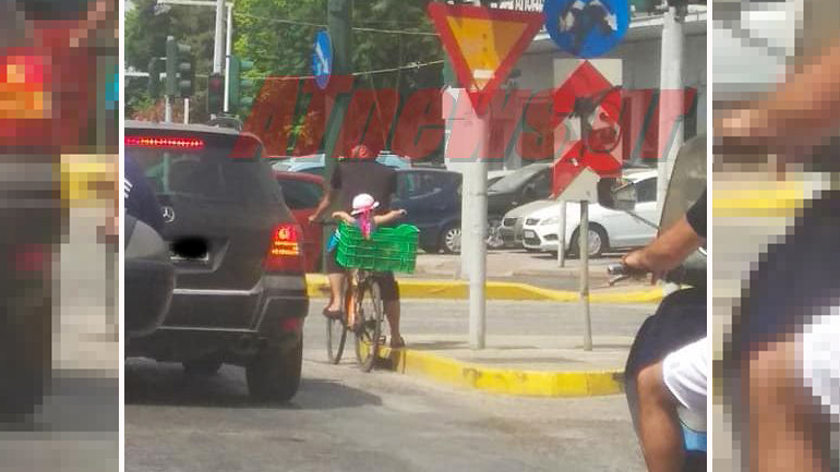 Η φωτογραφία είναι αληθινή – Μετέφερε παιδί (στη λεωφόρο Κηφισού) μέσα σε καφάσι!