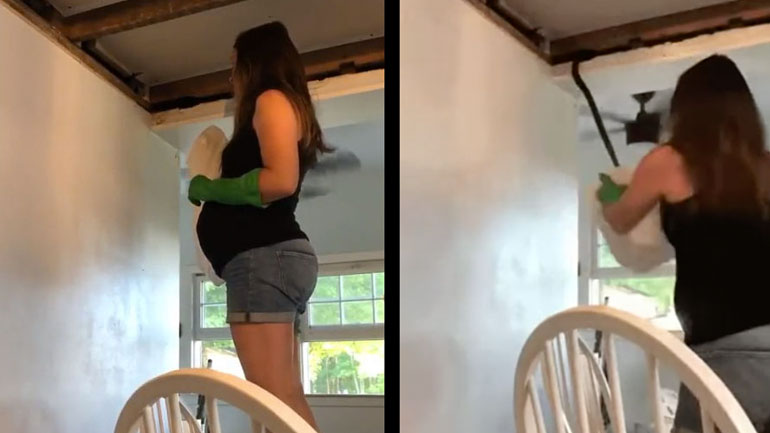 Μια έγκυος γυναίκα πιάνει ένα φίδι