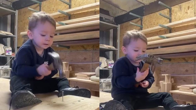 Αγοράκι καρφώνει ένα ξύλο 