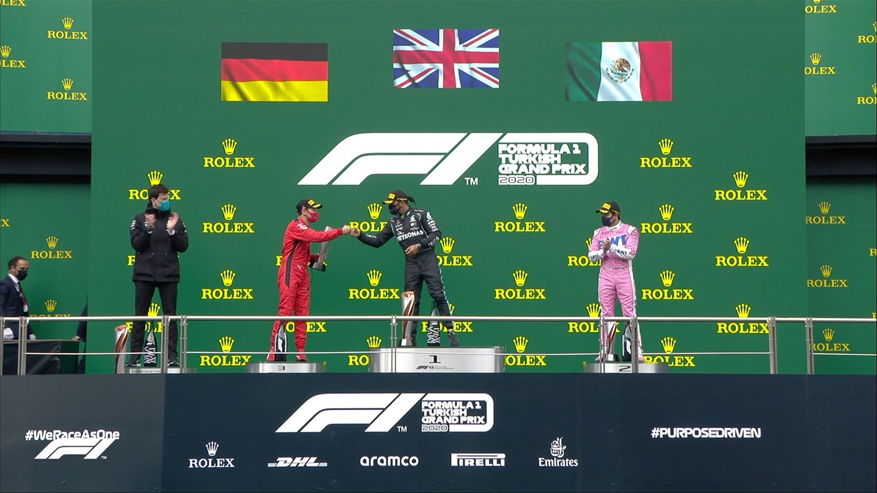 Το βάθρο του GP της Τουρκίας: Hamilton (1ος - μέση), Perez (2ος -  δεξιά) και Vettel (3ος - αριστερά)