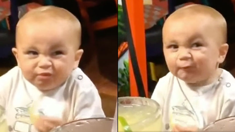 Μωρό δοκιμάζει ένα λεμόνι