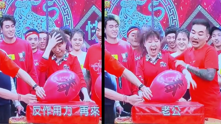 Σύζυγος βοηθά τη γυναίκα του σε ένα παιχνίδι