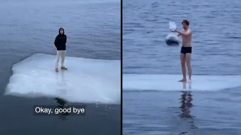 Άνδρας ανεβαίνει σε ένα κομμάτι πάγου