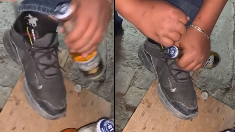 Ανοίγοντας ένα μπουκάλι μπίρας με ένα παπούτσι Ανοίγοντας ένα μπουκάλι μπίρας με ένα παπούτσι