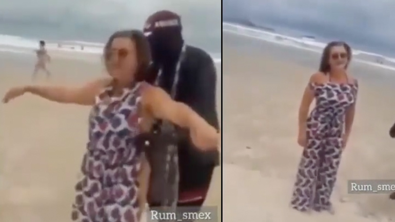 Σχεδιαστής μόδας σε μια παραλία