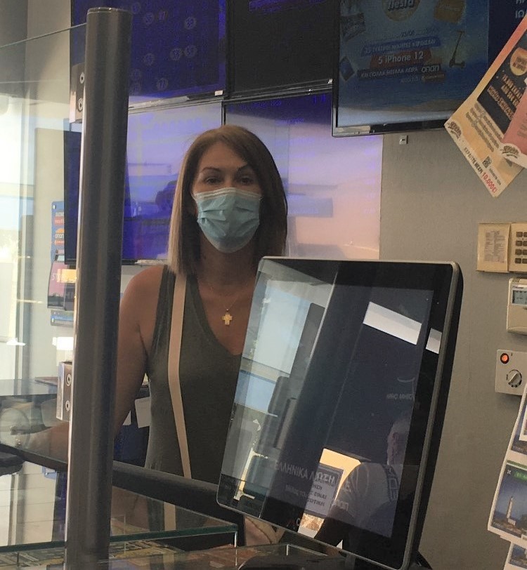Η κα. Ευτυχία Φλουρή, ιδιοκτήτρια καταστήματος ΟΠΑΠ στην περιοχή Γαζίου, στο Ηράκλειο Κρήτης.