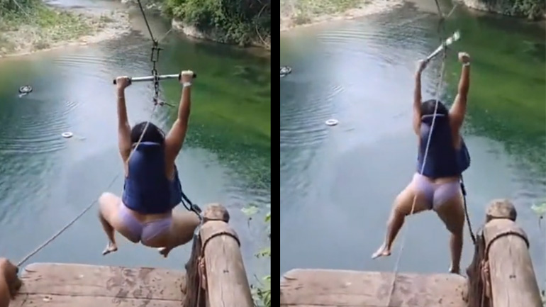 Μια γυναίκα δοκιμάζει zipline πάνω από μια λίμνη