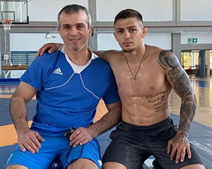 Ο Γιώργος Πιλίδης με τον προπονητή του, Χαράλαμπο Χαφουσίδη