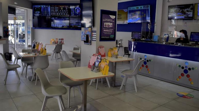 . Το κατάστημα ΟΠΑΠ όπου εργάζεται η κ. Μπαξεβανίδου στο Περιστέρι