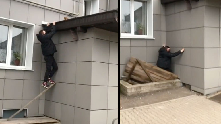 Mεθυσμένος προσπαθεί να σώσει μια γάτα από μια σκεπή