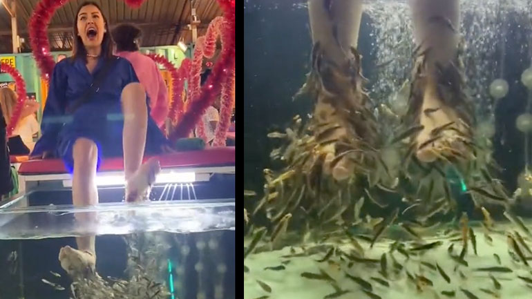 Τουρίστρια δοκιμάζει πεντικιούρ από ψάρια