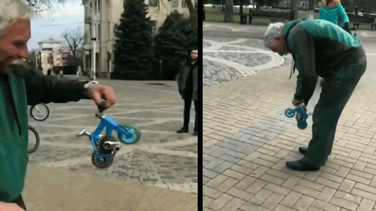 Άνδρας οδηγεί ένα μίνι ποδήλατο