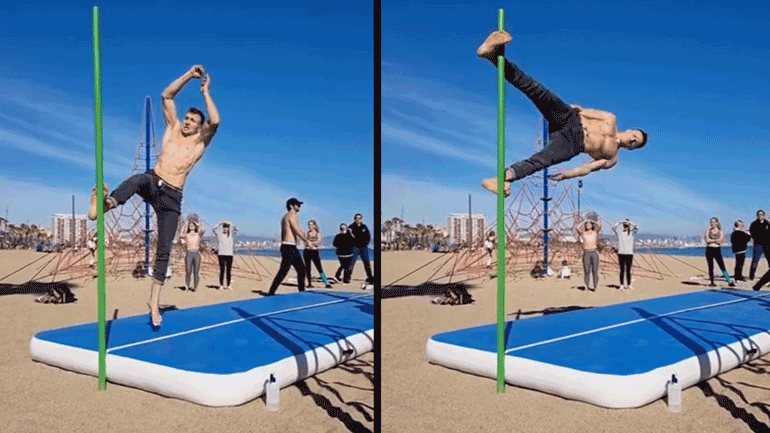 Άνδρας στηρίζεται με τα πόδια του οριζόντια σε ένα στύλο 