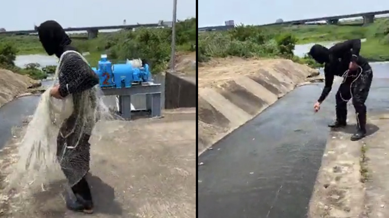 Άνδρας πιάνει ψάρια με ένα δίχτυ