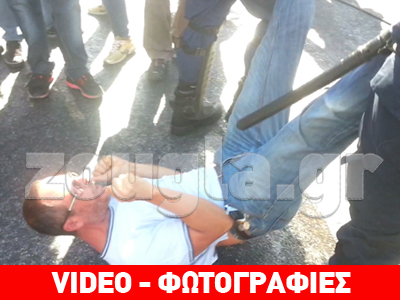 Άνδρας των ΜΑΤ σπρώχνει σχολικό φύλακα