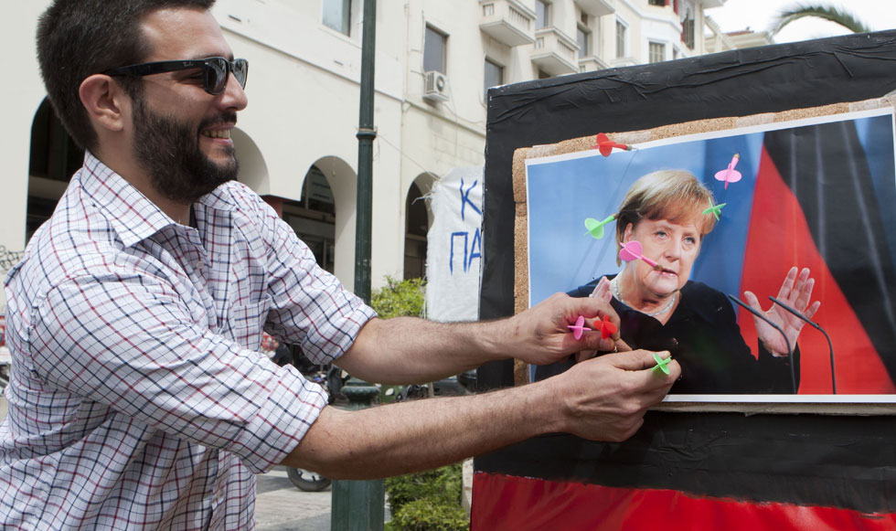 Διαμαρτυρία για την άφιξη της Μέρκελ