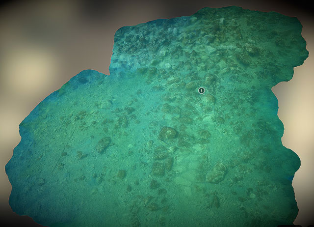 Τρισδιάστατη απεικόνιση της λίθινης θεμελίωσης του τείχους, που απολήγει σε υπερμεγέθη πεταλόσχημη κατασκευή