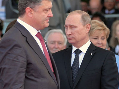 Χειραψία Πούτιν-Ποροσένκο στη σκιά της κρίσης