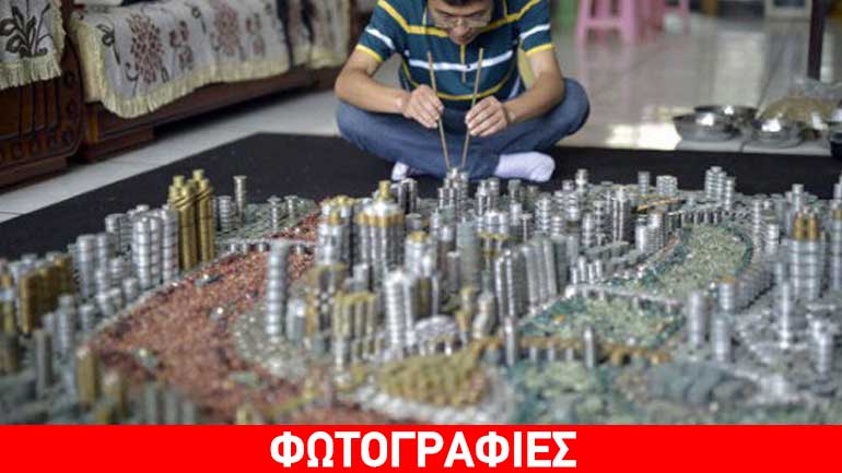 Κίνα: Έφτιαξε μικρογραφία της πόλης του με 50.000 νομίσματα! Κίνα: Έφτιαξε μικρογραφία της πόλης του με 50.000 νομίσματα!