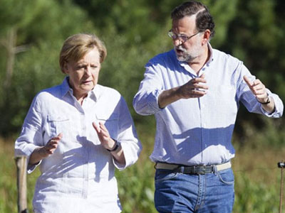 Συμβολική… πεζοπορία για Μέρκελ και Ραχόι