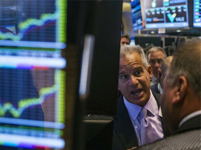 Συγκρατημένη αισιοδοξία και άνοδος στη Wall Street