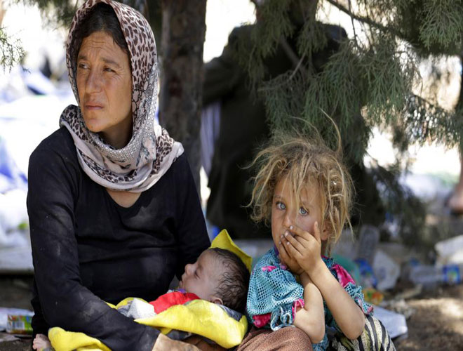 Πρόσφυγες Γεζίντι που διασώθηκαν. Άλλα μέλη της κοινότητάς τους δεν ήταν τόσο τυχερά