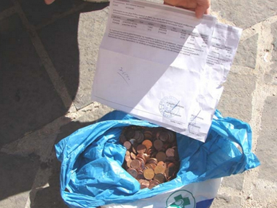 Πλήρωσε με 2.770 κέρματα τις κλήσεις του!