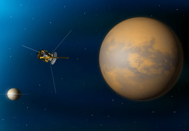 Καλλιτεχνική αντίληψη του διαστημικού αεροσκάφους Cassini όπως περιφέρεται γύρω από τον Τιτάνα. Στο βάθος αριστερά διακρίνεται ο Κρόνος με τα δαχτυλίδια του (NASA/JPL-Caltech)