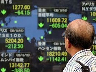 Χαμόγελα στο χρηματιστήριο του Τόκιο Χαμόγελα στο χρηματιστήριο του Τόκιο