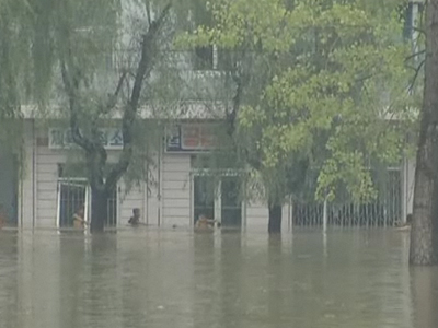 Τραγικός απολογισμός από τις πλημμύρες στη Β. Κορέα Τραγικός απολογισμός από τις πλημμύρες στη Β. Κορέα