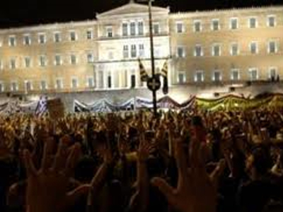 Τα διεθνή Μ.Μ.Ε. για την ψήφο εμπιστοσύνης